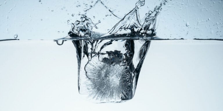 ice dropping into water