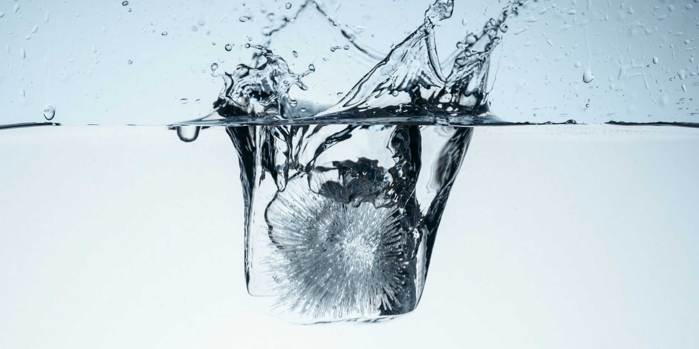 ice dropping into water